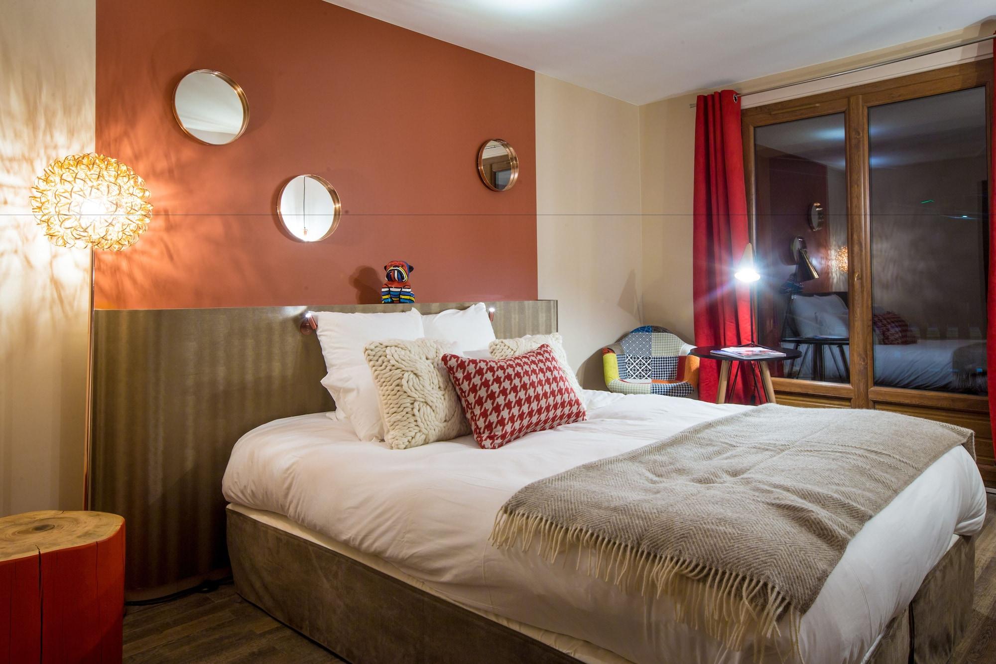 Grandes Rousses Hotel & Spa Alpe d'Huez Ngoại thất bức ảnh A bedroom at the hotel