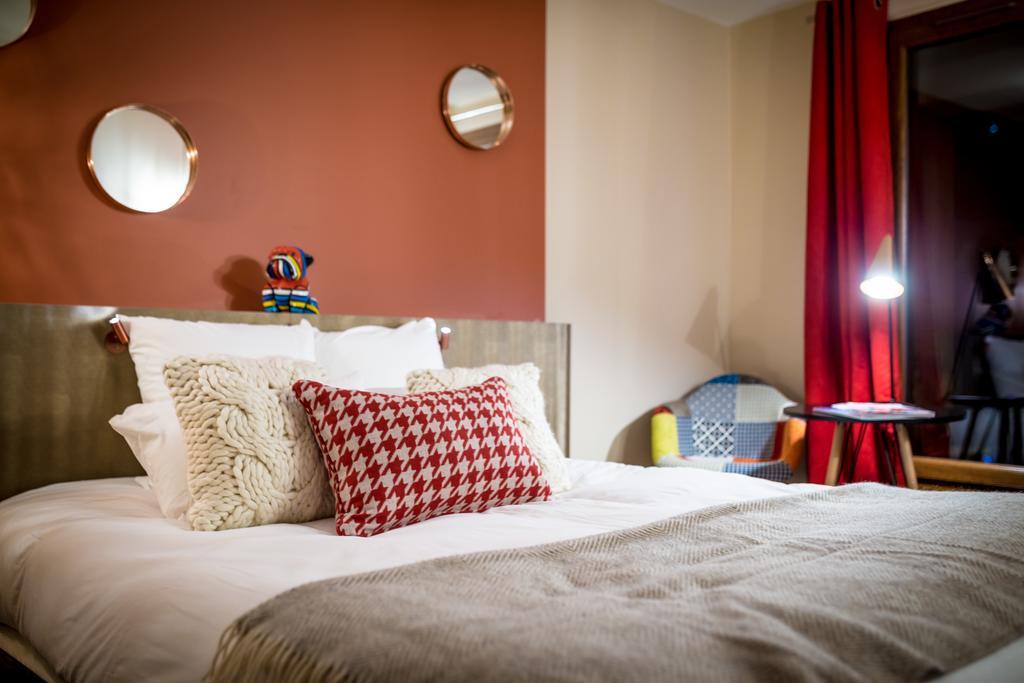 Grandes Rousses Hotel & Spa Alpe d'Huez Ngoại thất bức ảnh A bedroom at the hotel