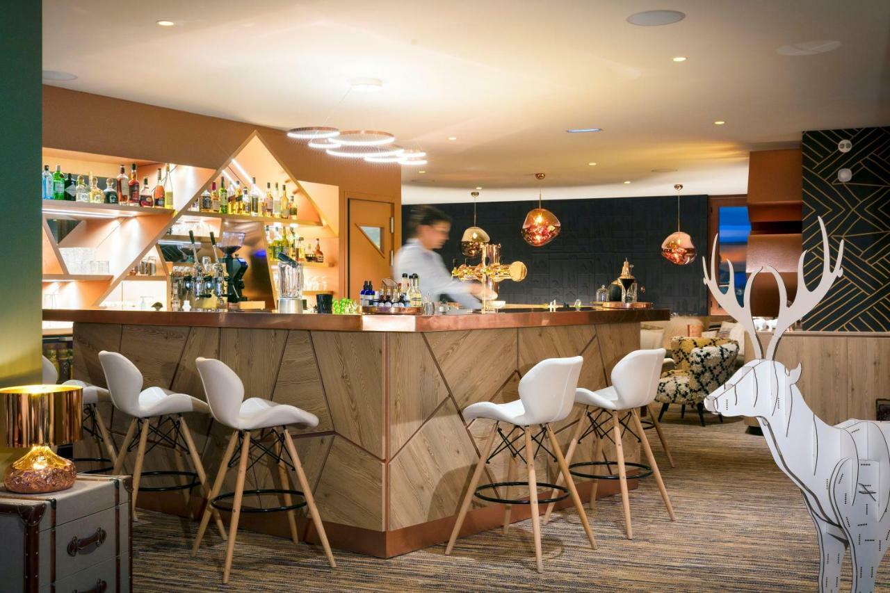 Grandes Rousses Hotel & Spa Alpe d'Huez Ngoại thất bức ảnh The bar at the hotel